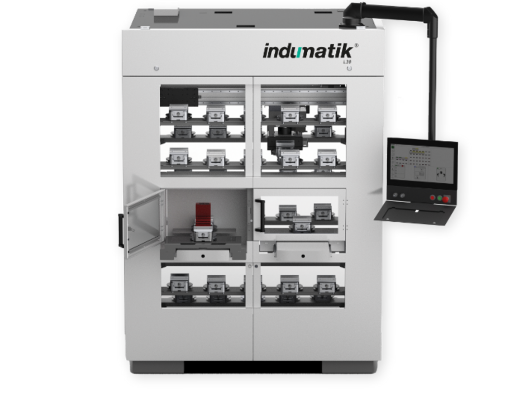 INDUMATIK – L 30.  Ein geschlossener Automat für den Werkstückwechsel. Die Themen Fräsen, Spannen und Automatisieren werden durch eine hohe Anzahl an Palettenplätzen bei kompakter Bauweise elegant miteinander verbunden.