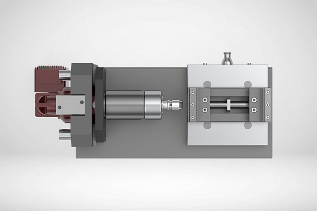 SCHRAUBER­STATION. Das Spannen können Sie ab sofort der Indumatik mit Schrauberstation überlassen. Die elektrische Schrauberstation passt den Spannstock automatisch auf das erforderliche Format des Werkstücks an. Der Indumatik-Greifer legt das Werkstück aus dem Regal in den Spannstock vor der Schrauberstation ein und die Schrauberstation spannt automatisch. Nach dem Spannvorgang nimmt der Greifer den Spannstock mit dem Werkstück auf und bringt ihn in die Bearbeitungsmaschine ein. Die elektrische Schrauberstation und die elektrische Rüststation sind für die Hybridanlagen Indumatik VL 40, VL 80 und VR 70 sowie die Indumatik 200 optional erhältlich.